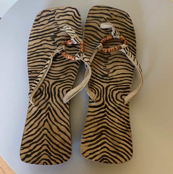 Large brown striped sandals