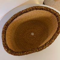 Light brown flower basket with brown beads