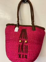 Kenyan sisal kiondo with a short leather handle. Beads and leather strips at the front.